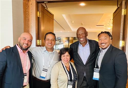 Members of the Chelsea Children's Cabinet pictured with Geoffrey Canada at a conference at Harvard University.